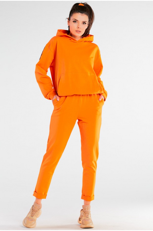 Spodnie dresowe bawełniane z kieszeniami, pomarańczowe - lewo