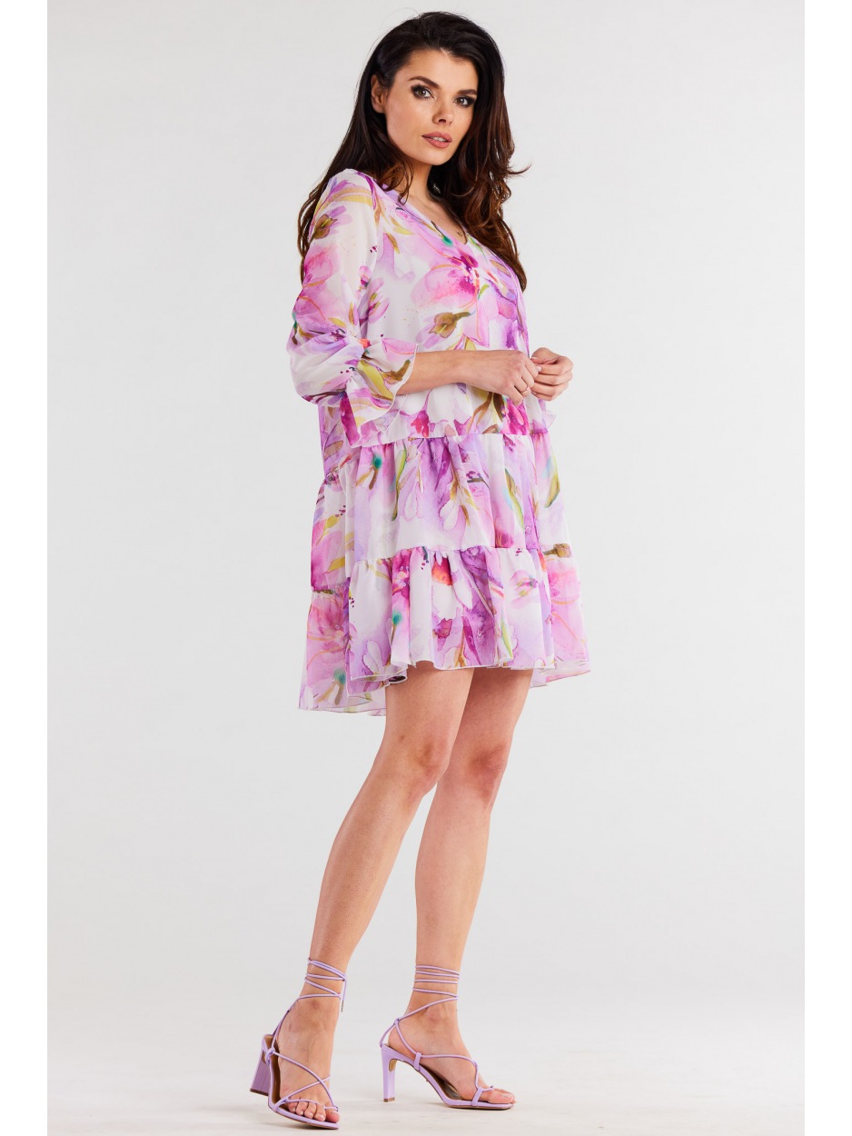 Luźna sukienka mini z dekoltem V i rękawami ¾ - fioletowe kwiaty - lewo